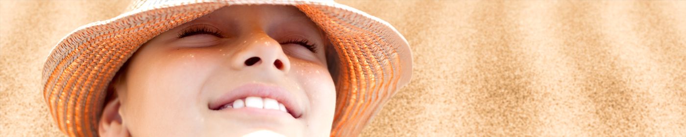 Visage enfant sur la plage